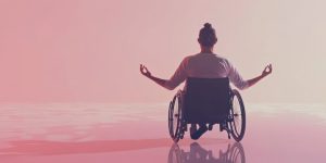 person in wheelchair doing yoga